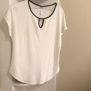 Pretty n Stylish Top with black piping n nice neck